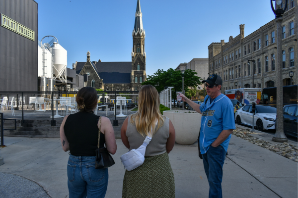 Guests enjoying a Milwaukee Fun Beer Tour exploring local breweries in downtown Milwaukee.